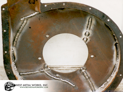 Repair of feed blower housing. Challenging because of round shape and originally made from cast iron.